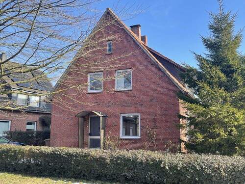 Straßenansicht - 6 Zimmer Einfamilienhaus zum Kaufen in Schortens