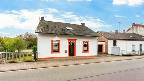 Außenansicht 1 - 5 Zimmer Einfamilienhaus zum Kaufen in Merzig - Besseringen