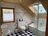 Badezimmer im Obergeschoss - 