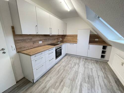 Küche mit EBK ETW DG links - 