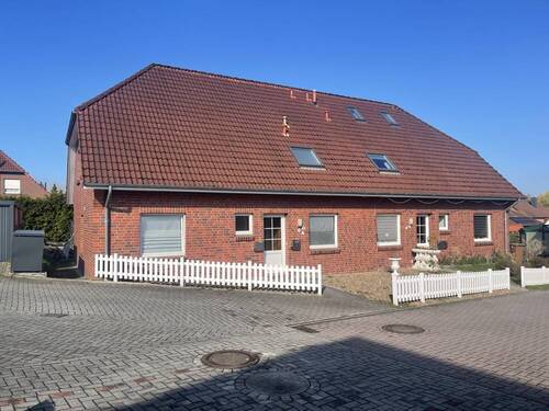 Seitenansicht - 1 Zimmer Mehrfamilienhaus, Wohnhaus in Schortens