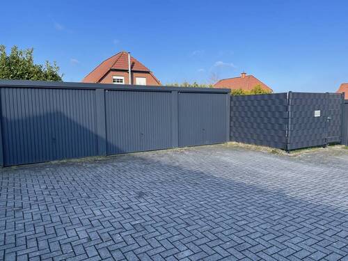 Garagen - Mehrfamilienhaus, Wohnhaus mit 297,20 m&sup2; in Schortens zum Kaufen
