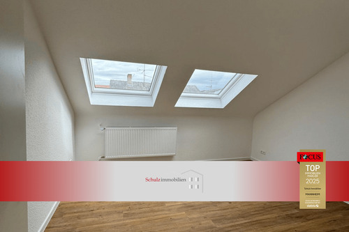 Titelfoto Wohnzimmer - Kernsaniert: 2-Zimmer-Dachgeschosswohnung in gepflegtem Mehrfamilienhaus auf der Parkinsel