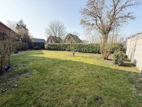 Blick in den Garten - Mehrfamilienhaus, Wohnhaus mit 190,00 m&sup2; in Stuhr zum Kaufen