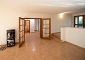 Wohnzimmereingang mit Kamin - 