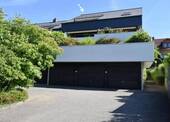 Hausansicht - Seenah gelegene 2,5 - 3-Zimmer Dachgeschosswohnung mit Seeblick und Dachterrasse
