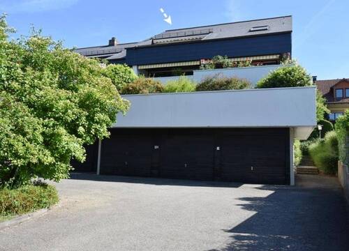 Hausansicht - Seenah gelegene 2,5 - 3-Zimmer Dachgeschosswohnung mit Seeblick und Dachterrasse