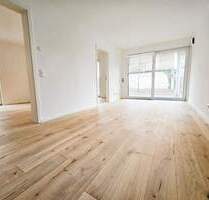 NEUBAU-ERSTBEZUG: Top moderne 3-Zimmerwohnung mit eigenem Garten und Terrasse -KfW-Effizienzhaus-40 - Frankfurt am Main Hausen