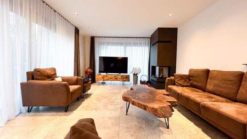 Wohnzimmer EG - Einfamilienhaus mit 238,00 m² in Langenau zum Kaufen