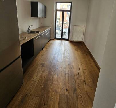 Küche mit Ausgang zum Balkon - 2 Zimmer Etagenwohnung in Fürth