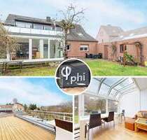 PHI AACHEN - Charmantes Zweifamilienhaus mit beheiztem Wintergarten und großem Garten in Euskirchen!