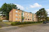 Hausansicht - Potenzial zum Wohntraum in Qualitätswohnlage mit Balkon und freien Stellplätzen!