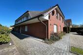 Hausansicht - Wohnen am Meer - Große 3-Zimmer-Wohnung in toller Wohnlage mit Terrasse und Garten!