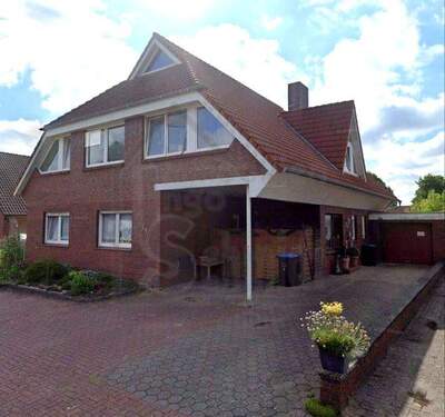 Hauptansicht - 'Investieren Sie in Geborgenheit: Zweifamilienhaus in familienfreundlicher Siedlung!