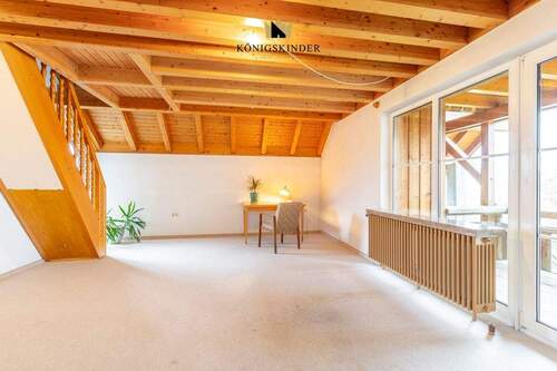 Wohnzimmer DG 1 mit Räubertreppe ins DG 2 - 