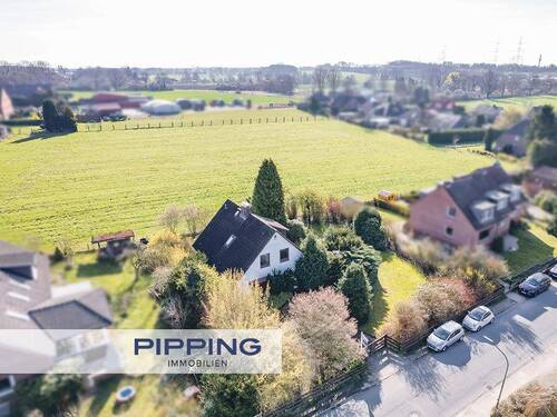 Titelbild - Wohlfühlen in Feldrandlage: 'Charmantes Einfamilienhaus auf großem Grundstück in Oststeinbek'