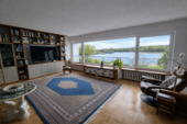 Wohnzimmer mit Seeblick - 1 Zimmer Mehrfamilienhaus, Wohnhaus zum Kaufen in Tröbitz