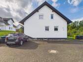 Seitenansicht - 2 Zimmer Etagenwohnung in Hilchenbach