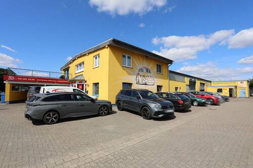 Außenansicht - Gut vermietetes Wohn- und Bürohaus mit Hallengebäude in Isenbüttel