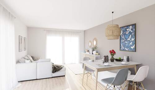 Lichtdurchfluteter Wohnbereich dank bodentiefer Fenster - 