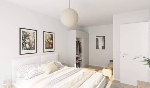 Ein komfortables Schlafzimmer mit Balkonzugang - 