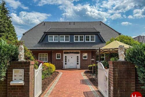 Verkauf Wohnhaus Syke-Gessel - H&T Immobilien - Einzigartiges Architektenhaus mit großzügigem Garten in begehrter Dorflage