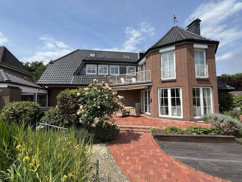 Gartenansicht - Einfamilienhaus mit 312,00 m² in Syke zum Kaufen