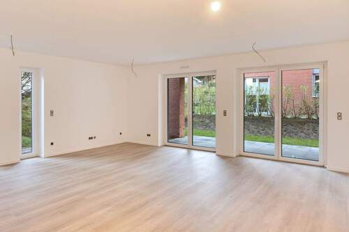 Wohnzimmer - Ruhige Eigentumswohnung im Neubau in Rieseby mit Terrasse