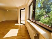 Wohnzimmer zum Garten - 3 Zimmer Etagenwohnung in München