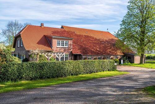 Straßenansicht (2) - 8 Zimmer Mehrfamilienhaus, Wohnhaus zum Kaufen in Bockhorn-Moorwinkelsdamm