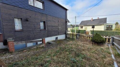 seitliche Ansicht - Einfamilienhaus mit 100,00 m&sup2; in Zobes zum Kaufen