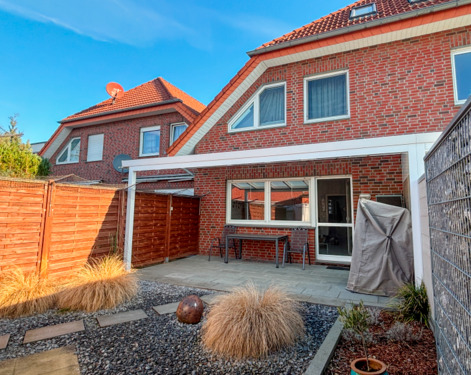 Rückansicht - Reihenmittelhaus mit 99,00 m&sup2; in Herzebrock-Clarholz zum Kaufen