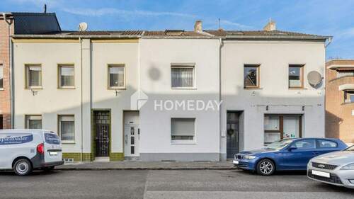 Außenansicht 1 - 7 Zimmer, 3 Etagen und ein Garten: gepflegtes RMH mit viel Raum für Ihre Ideen