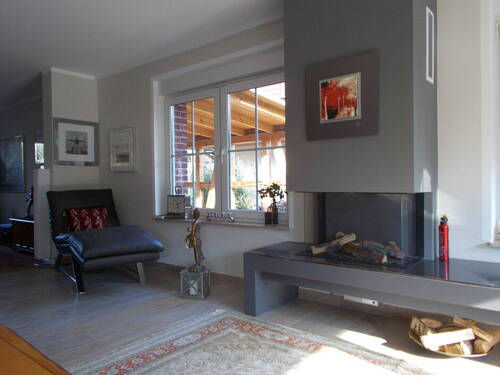 Wohnzimmer mit Kamin - 