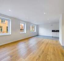 Wohlfühlen ohne Hindernisse - exklusive Erdgeschosswohnung mit A+ Effizienz und Terrasse - Husum