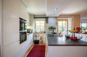 Küche (Ansicht 1) - 3 Zimmer Etagenwohnung zum Kaufen in Aschau im Chiemgau