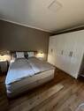 Schlafzimmer mit Boxspringbett - 