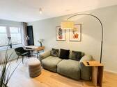Wohnbereich - Stilvoll & ruhig am Herdweg - möbliertes Apartment mit Balkon in Stuttgart-West