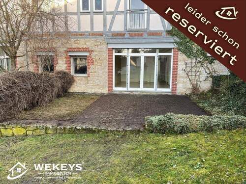 Ansicht aus dem Garten mit Terrasse - Wohnen mit Ruhe, Licht und Lebensqualität - 3-Zimmer-Wohnung mit Terrasse in Kapellendorf