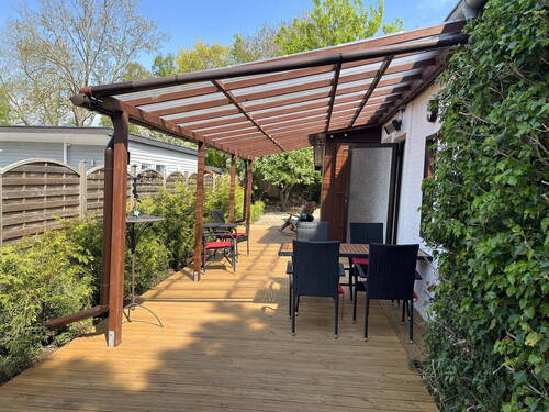 große überdachte Terrasse-West - 6 Zimmer Bungalow in Timmendorfer Strand/Niendorf