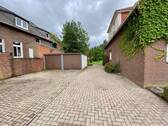 Hof mit Doppelgarage - Mehrfamilienhaus, Wohnhaus mit 153,10 m² in Fürstenau zum Kaufen
