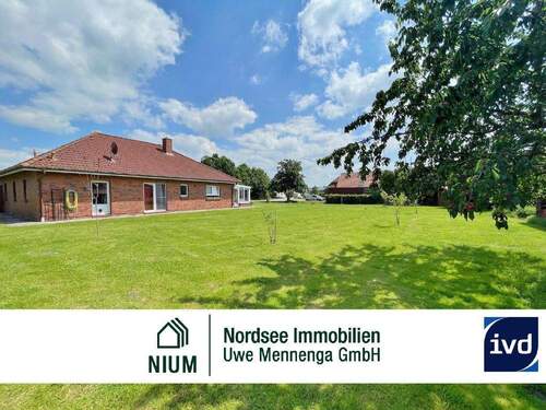 Bild1 - GEPFLEGTER EBENERDIGER BUNGALOW inkl. BEBAUBARER FREIFLÄCHE IM GEWERBEGEBIET