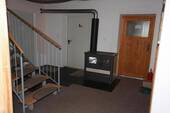 UG Flur mit Holzofen - 