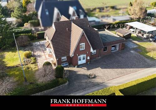 V10796 Titelbild - Großzügiges Einfamilienhaus auf weitläufigem Grundstück in ruhiger Lage von Halstenbek.