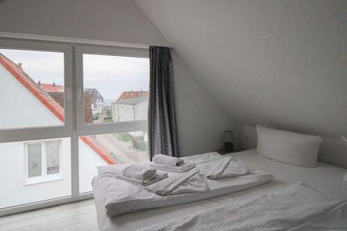 Schlafzimmer mit Hafenblick - 