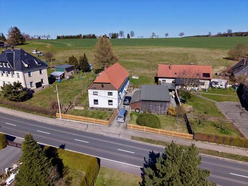 Ansicht Straße - Einfamilienhaus mit 110,00 m&sup2; in Neustadt zum Kaufen