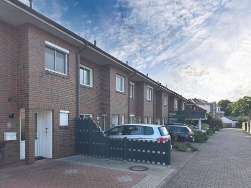 Straßenansicht - Reihenmittelhaus mit 106,80 m&sup2; in Stuhr zum Kaufen