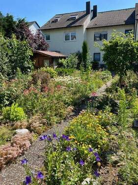 pflegeleichter Garten mit Brunnenanlage - 6 Zimmer Reihenmittelhaus zum Kaufen in Mutterstadt