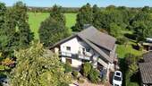Luftbild Feldrandlage - 7 Zimmer Mehrfamilienhaus, Wohnhaus in Groß-Zimmern / Klein-Zimmern