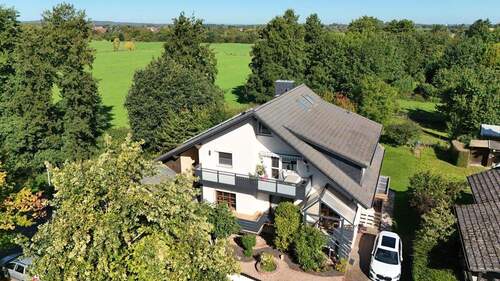 Luftbild Feldrandlage - 7 Zimmer Mehrfamilienhaus, Wohnhaus in Groß-Zimmern / Klein-Zimmern